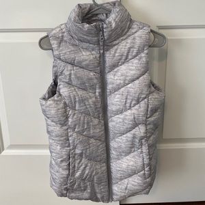 Never worn Grey puff vest. Size medium